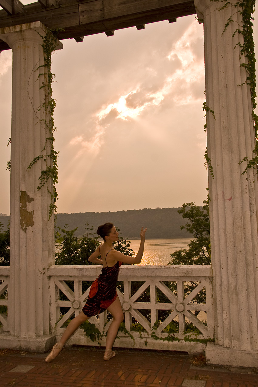 Ananda dancing outside by lake